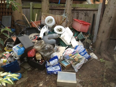 Waste removal trucks servicing Soho neighborhoods